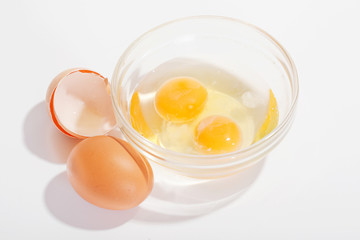 Plate with broken eggs