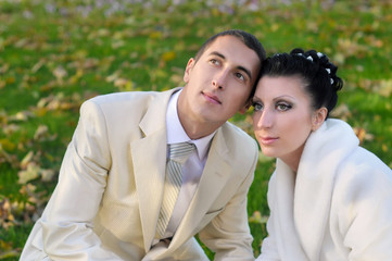 Fototapeta premium Bride and groom on the grass