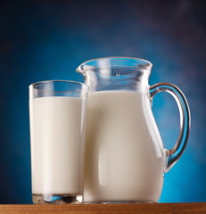 Glass and jar of milk. photo.
