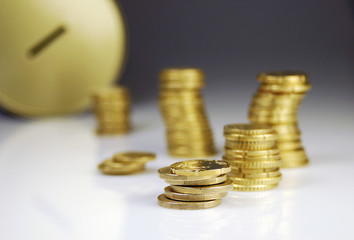 Coins and piggy bank