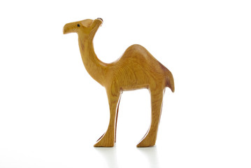 A wooden camels isolated on a white background