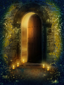 Drzwi fantasy ze świecami i bluszczem