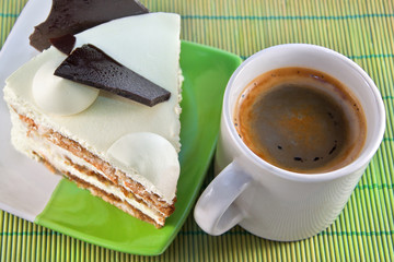 cup of coffee and sweet cake with chocolate