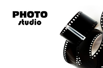 Fototapeta na wymiar black photo film and text photo studio. isolated on white backgr