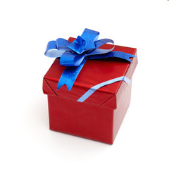 red gift box with blue bow