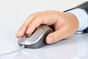 Computer mouse and men's hand