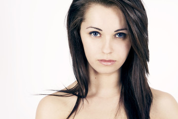 Obraz premium Portrait of young woman on white background