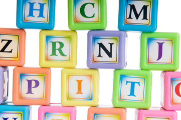Learning and education concept - pile of alphabet blocks