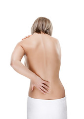 Naklejka premium Woman massaging pain back isolated on white