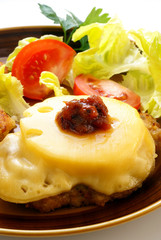 Pork Steak “Hawaii” with Pineapple grated with cheese