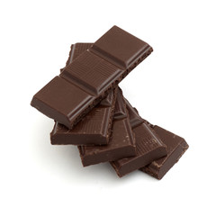 chocolate pieces on white background