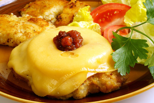 Pork Steak “Hawaii” with Pineapple grated with cheese