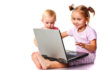 Children playing on laptop