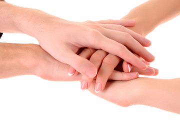 Pile of hands isolated on white