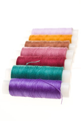 coil with colored threads