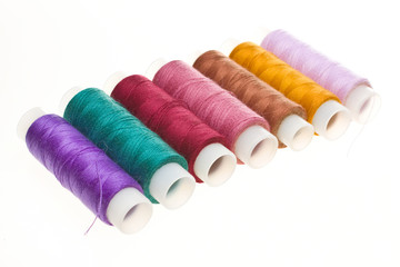 coil with colored threads