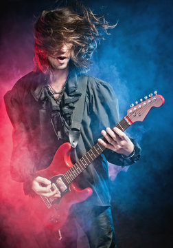 Rock-star playing a concert © kharkov.photo