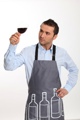 Sommelier tasting red wine