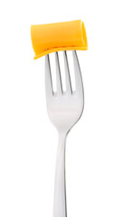 Cheddar cheese on fork isolated on white background,