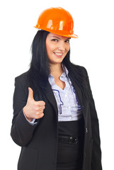 Happy architect woman giving thumbs