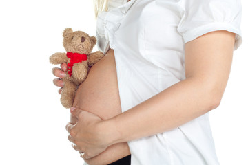 pregnant belly over white