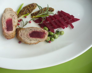 Meat roll stuffed with beets