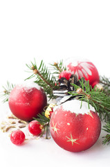 Red xmas baubles on the white