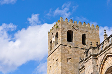 Tower of Sigenza cathedral against a beautiful blue sky