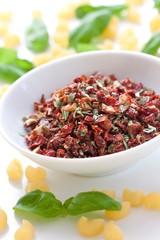 dried tomatoes with basil and salt