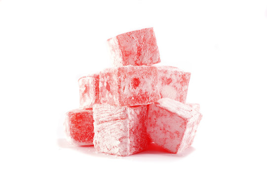 Sweet pieces of turkish delight on white background