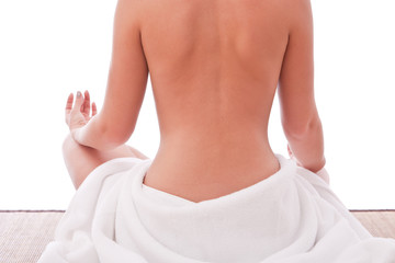 Nude women sitting  with towel around her waist