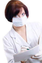 Nurse fills an out-patient card