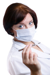 Nurse looks at thermometer