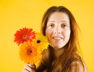 girl with flowers over yellow