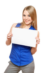 Fototapeta premium Cheerful young woman holding empty white board