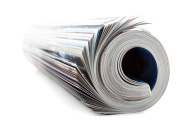 rolled magazine isolated on white