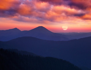 Landscape with a dawn in mountains
