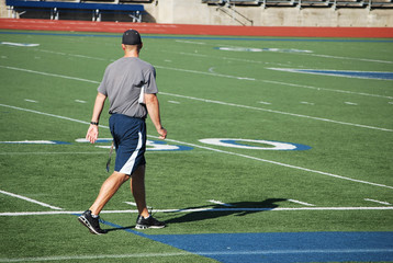 Sports stadium, coach