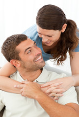 Portrait of a lovely couple looking at each other while hugging