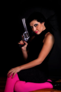 woman pink gun blow
