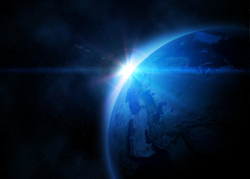 Fototapeta Planet earth with sunrise in space