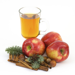 glass of apple juice, fresh fruits and spices