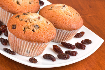 Muffins on a white plate
