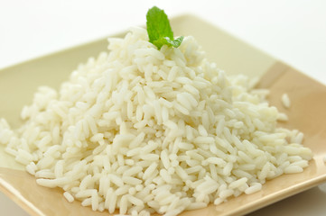 White steamed rice in a dish close up