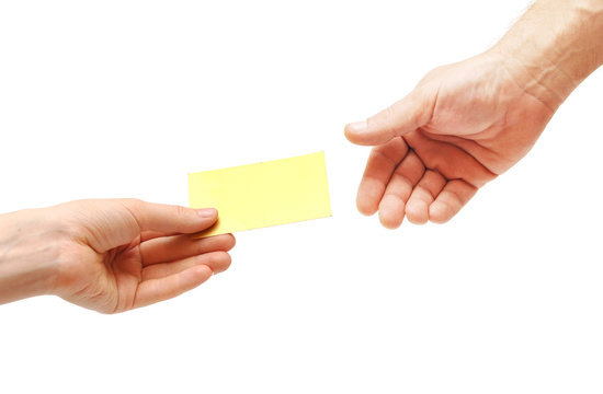 woman's hand passes blank business card
