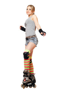 Attractive young blonde on roller skates