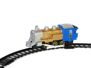 Child's toy, a locomotive on the rails, isolated