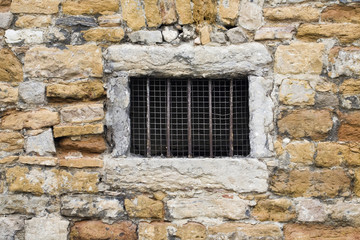 Fototapeta na wymiar old lattice window in wall