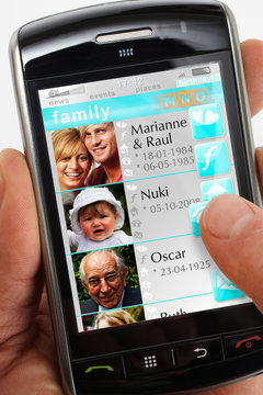 family faces on the cell phone