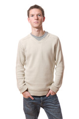 Fototapeta premium young man with hands in pockets isolated over white background